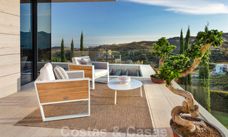 Instapklare, nieuwe moderne designvilla te koop in een kampioenschaps golfresort in Mijas, Costa del Sol 31904 