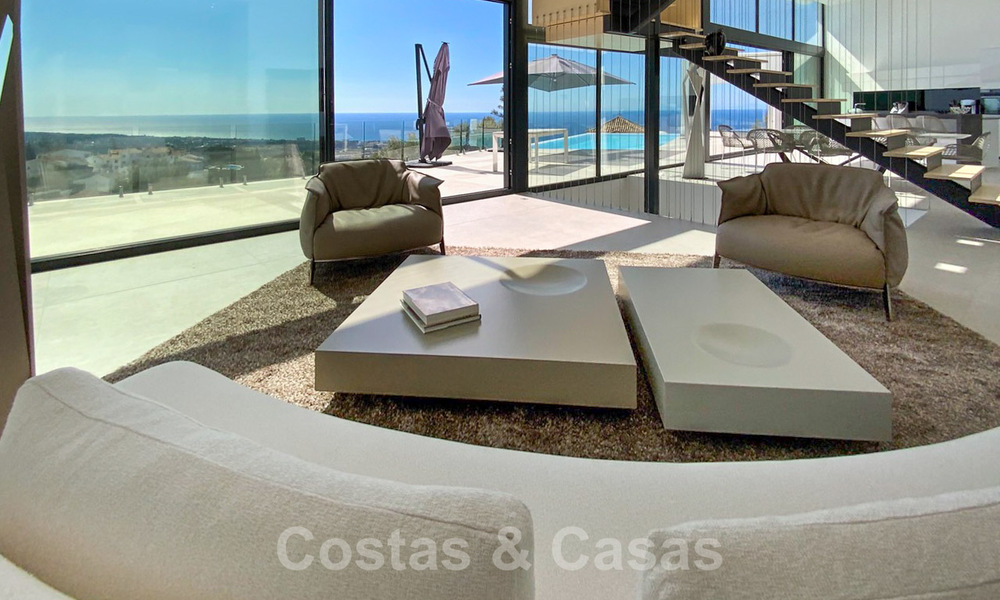 Instapklare nieuwe moderne villa te koop met prachtig open zeezicht in Marbella, dicht bij de stranden en het centrum 32140