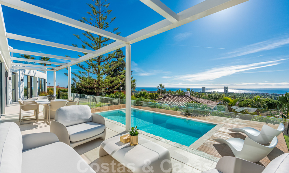 Elegante en ruime moderne nieuwe villa te koop met prachtig panoramisch zeezicht in Elviria, Marbella 32318