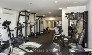 Modern 3 slaapkamer appartement te koop met zeezicht in een eerstelijns golf complex in Benahavis - Marbella 32560 