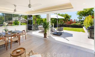Prachtig eigentijds gerenoveerd, zuid gericht, luxe tuinappartement te koop in Nueva Andalucia, Marbella 32866 