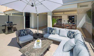 Prachtig eigentijds gerenoveerd, zuid gericht, luxe tuinappartement te koop in Nueva Andalucia, Marbella 32872 