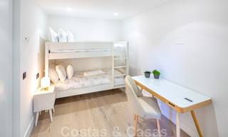 Prachtig eigentijds gerenoveerd, zuid gericht, luxe tuinappartement te koop in Nueva Andalucia, Marbella 32883 
