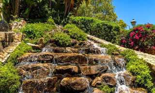 Prachtig eigentijds gerenoveerd, zuid gericht, luxe tuinappartement te koop in Nueva Andalucia, Marbella 32895 