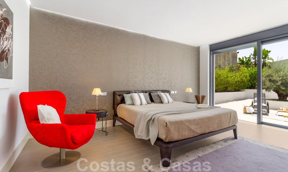 Instapklare exclusieve moderne luxevilla te koop in Benahavis - Marbella met schitterend open uitzicht over de golf en de zee 33508