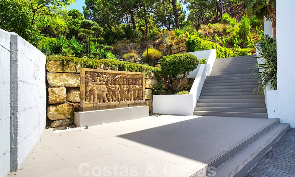 Instapklare exclusieve moderne luxevilla te koop in Benahavis - Marbella met schitterend open uitzicht over de golf en de zee 33559