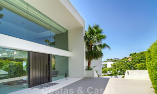 Instapklare exclusieve moderne luxevilla te koop in Benahavis - Marbella met schitterend open uitzicht over de golf en de zee 33563 