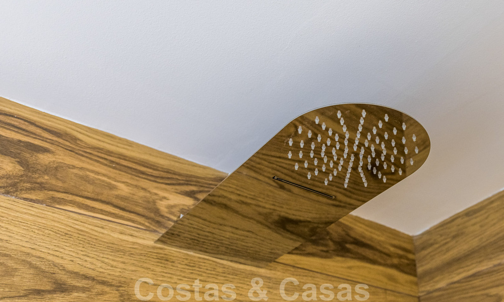 Eerstelijnsstrand luxe tuinappartement te koop in een exclusief complex tussen Marbella en Estepona 34194