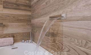 Eerstelijnsstrand luxe tuinappartement te koop in een exclusief complex tussen Marbella en Estepona 34205 