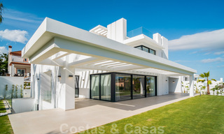 Instapklare, moderne nieuwbouwvilla te koop met zeezicht in vijfsterren golfresort in Marbella - Benahavis 34548 