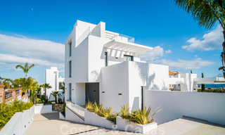 Instapklare, moderne nieuwbouwvilla te koop met zeezicht in vijfsterren golfresort in Marbella - Benahavis 34556 