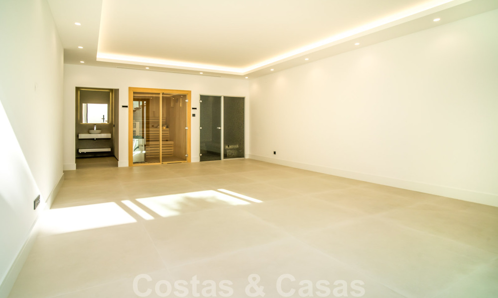 Instapklare, moderne nieuwbouwvilla te koop met zeezicht in vijfsterren golfresort in Marbella - Benahavis 34586