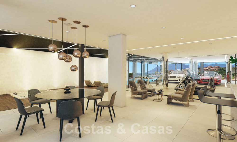 Sterk in prijs verlaagd! Instapklare moderne designvilla te koop met panoramisch golf- en zeezicht in een vijfsterren golfresort in Marbella - Benahavis 34619