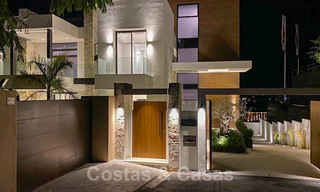 Sterk in prijs verlaagd! Instapklare moderne designvilla te koop met panoramisch golf- en zeezicht in een vijfsterren golfresort in Marbella - Benahavis 34632 