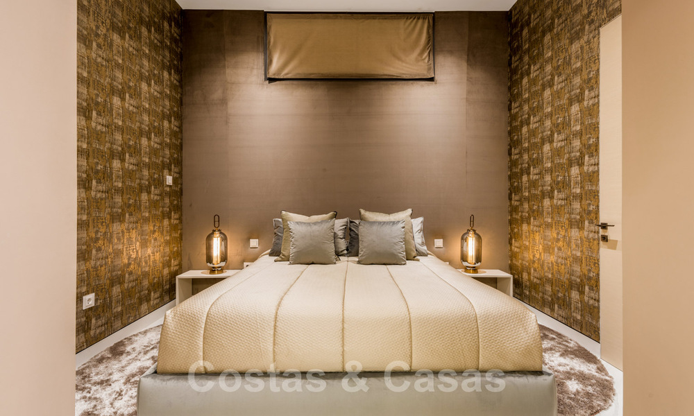 Neusje-van-de-zalm, modern instapklaar appartement te koop, direct aan het strand tussen Marbella en Estepona 34683