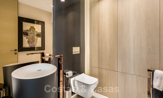 Neusje-van-de-zalm, modern instapklaar appartement te koop, direct aan het strand tussen Marbella en Estepona 34687 