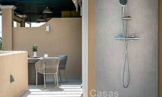 Eigentijds gerenoveerd appartement te koop met ruim terras, zee- en bergzicht in La Quinta golfresort, Benahavis - Marbella 34857 