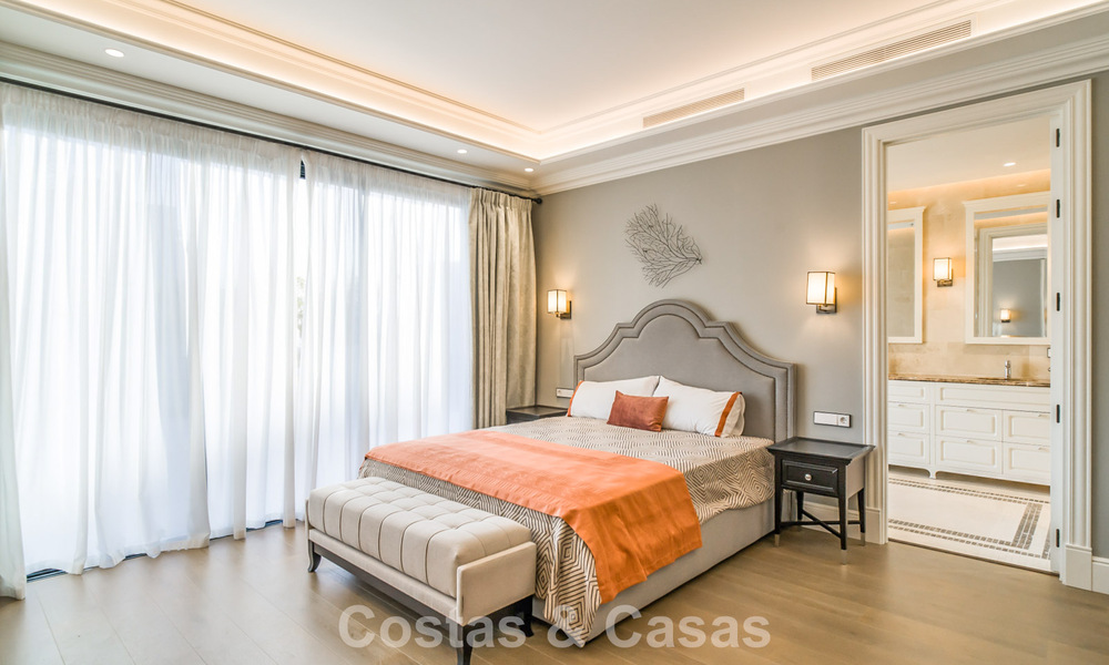 Luxevilla te koop in een eigentijdse klassieke stijl met zeezicht in vijfsterren golfresort in Marbella - Benahavis 775517