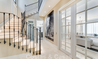 Nieuwbouw villa te koop in een hedendaagse klassieke stijl met zeezicht in vijfsterren golfresort in Marbella - Benahavis 34952 