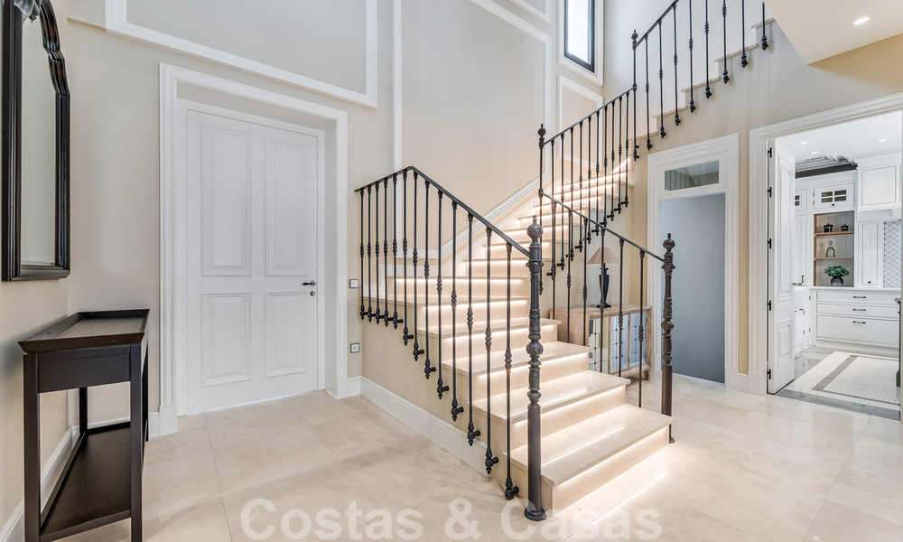 Nieuwbouw villa te koop in een hedendaagse klassieke stijl met zeezicht in vijfsterren golfresort in Marbella - Benahavis 34953