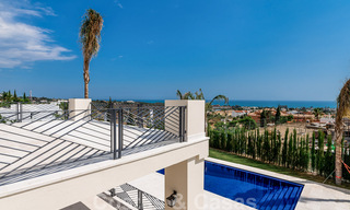 Nieuwbouw villa te koop in een hedendaagse klassieke stijl met zeezicht in vijfsterren golfresort in Marbella - Benahavis 34967 