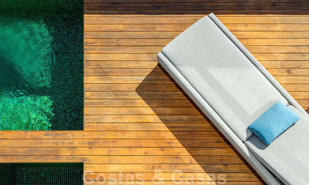 Tweedelijnsstrand luxevilla te koop in Puente Romano, Golden Mile, Marbella 35625