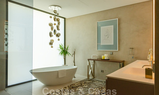 Instapklare, nieuwe moderne villa te koop met zeezicht vanaf ieder niveau in een vijfsterren golfresort in Marbella - Benahavis 35746 