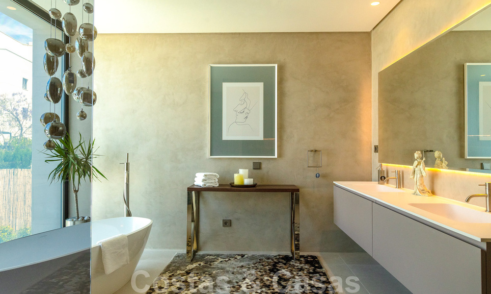 Instapklare, nieuwe moderne villa te koop met zeezicht vanaf ieder niveau in een vijfsterren golfresort in Marbella - Benahavis 35747