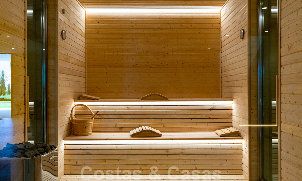 Instapklare, nieuwe moderne villa te koop met zeezicht vanaf ieder niveau in een vijfsterren golfresort in Marbella - Benahavis 35758