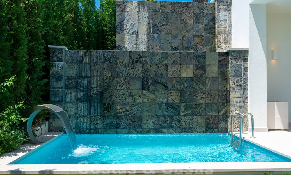 Instapklare, nieuwe moderne villa te koop met zeezicht vanaf ieder niveau in een vijfsterren golfresort in Marbella - Benahavis 35772