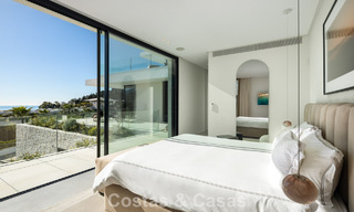 Sensationele moderne luxevilla te koop met zeezicht in “gated” El Madroñal in het gebied van Marbella - Benahavis 779449 