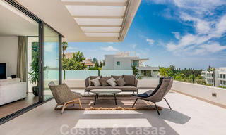 Instapklaar, modern designer penthouse te koop met 3 slaapkamers in een luxueus woonoord in Marbella - Estepona 36735 