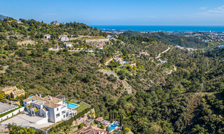Majestueuze, hedendaagse, mediterrane luxevilla te koop met zeezicht in het exclusieve El Madroñal in Benahavis - Marbella 38875 