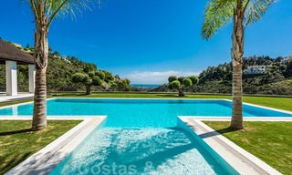 Majestueuze, hedendaagse, mediterrane luxevilla te koop met zeezicht in het exclusieve El Madroñal in Benahavis - Marbella 38882 