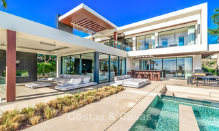 Moderne, architecturale villa met panoramisch zeezicht te koop in een vijfsterren golfresort in Marbella - Benahavis 791732 