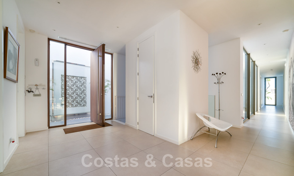 Riante, architecturale villa te koop met spectaculair open zeezicht in een gated community in Benahavis - Marbella 39929