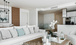 Instapklare, moderne - Andalusische, luxueuze nieuwbouw appartementen te koop met zeezicht in een gated resort in Benahavis - Marbella 40254 