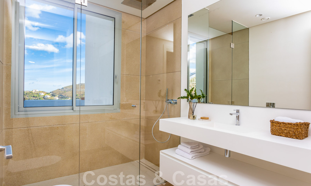 Instapklare, moderne - Andalusische, luxueuze nieuwbouw appartementen te koop met zeezicht in een gated resort in Benahavis - Marbella 40283