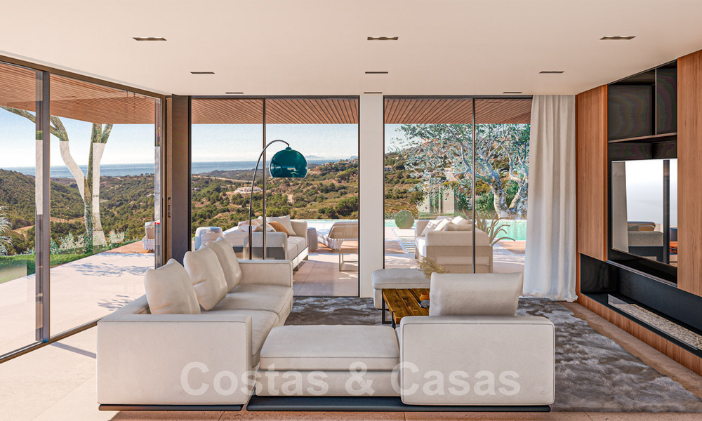 Moderne villa te koop in een natuurlijke omgeving, met panoramisch uitzicht op de vallei en de zee, in een gated resort in Benahavis - Marbella 40520