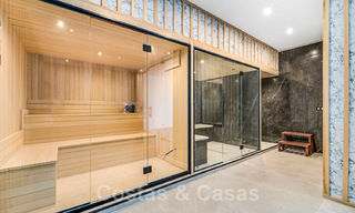 Designer villa te koop met panoramisch zeezicht in een prestigieus golfresort in Benahavis - Marbella 40947 