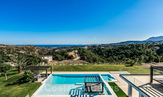 Designer villa te koop met panoramisch zeezicht in een prestigieus golfresort in Benahavis - Marbella 40954 