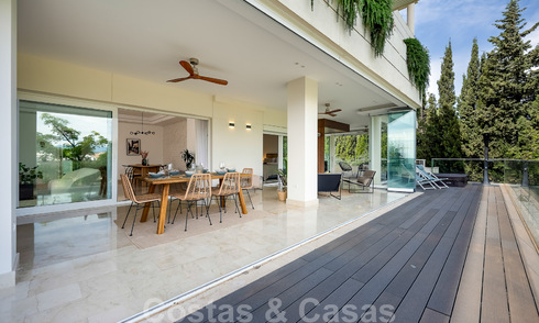 Gerenoveerd, modern appartement te koop met een ruim terras te Nueva Andalucia, Marbella 41351