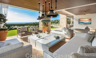 Eigentijdse, moderne luxevilla te koop in resort stijl met panoramisch zeezicht in Cascada de Camojan in Marbella 42103 