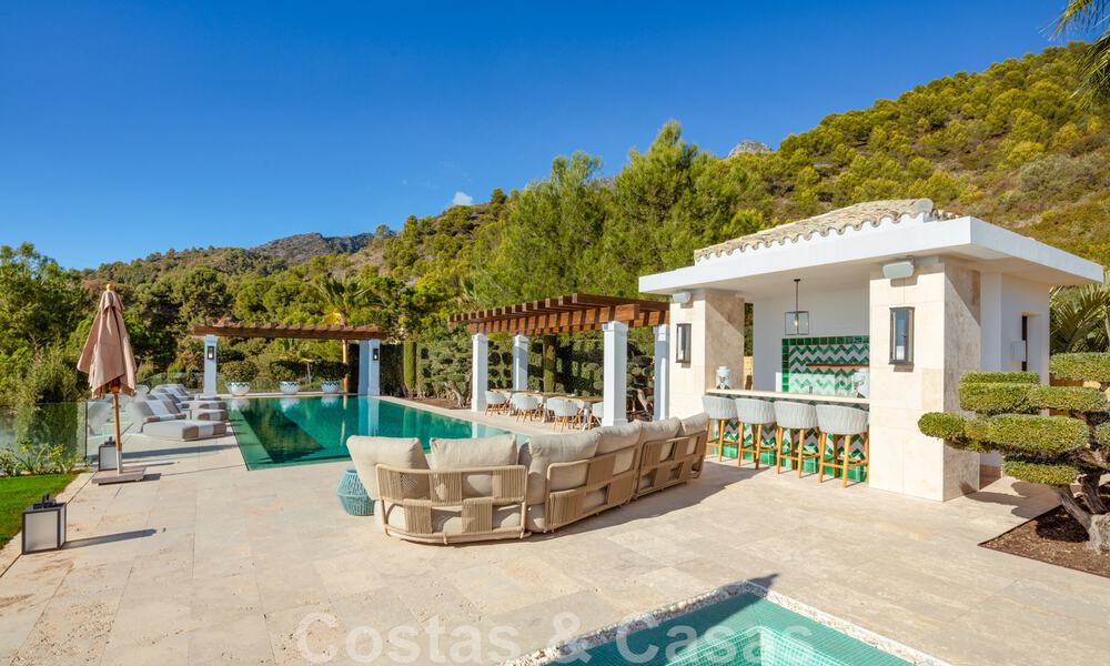 Eigentijdse, moderne luxevilla te koop in resort stijl met panoramisch zeezicht in Cascada de Camojan in Marbella 42106
