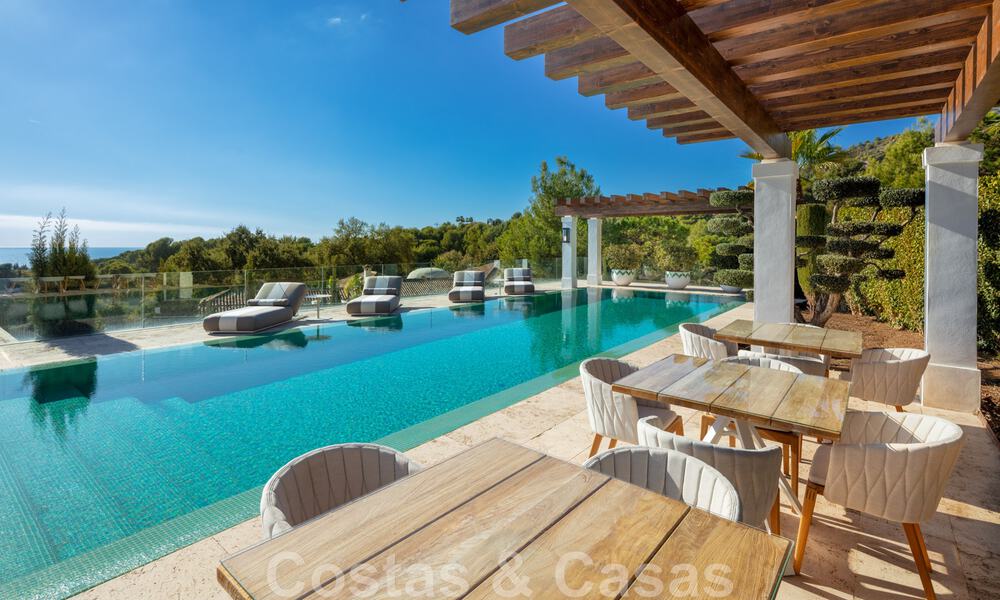 Eigentijdse, moderne luxevilla te koop in resort stijl met panoramisch zeezicht in Cascada de Camojan in Marbella 42110