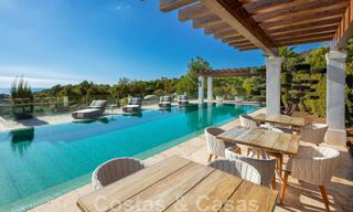 Eigentijdse, moderne luxevilla te koop in resort stijl met panoramisch zeezicht in Cascada de Camojan in Marbella 42110 