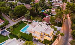 Indrukwekkende, moderne luxevilla met prachtig uitzicht op zee te koop in een begeerde urbanisatie op de Golden Mile van Marbella 44551 