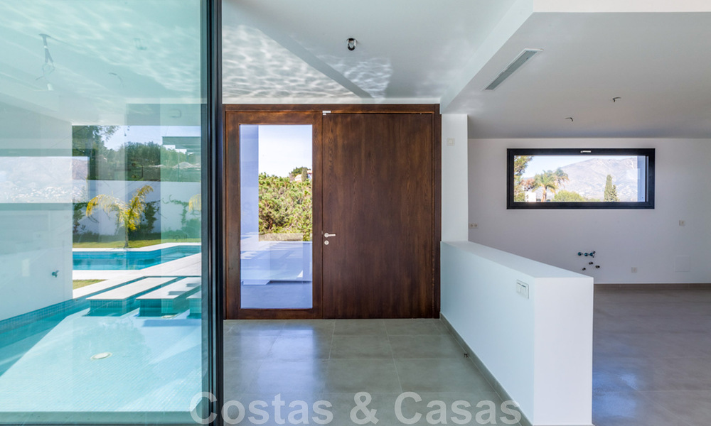 Nieuwe, eigentijdse villa te koop met open uitzicht op de golfbanen van het begeerde golfresort La Cala Golf, Mijas 44646