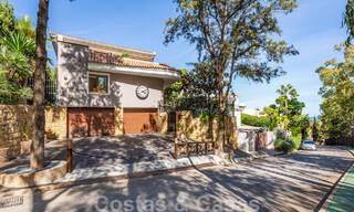 Unieke, mediterrane luxevilla te koop met rustgevend uitzicht op de golfbanen in een begeerde woonwijk in La Quinta, Benahavis - Marbella 48485 