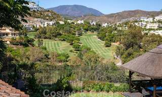 Unieke, mediterrane luxevilla te koop met rustgevend uitzicht op de golfbanen in een begeerde woonwijk in La Quinta, Benahavis - Marbella 48490 